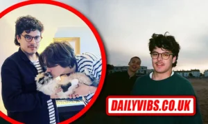 Luca Firth performing indie folk music with an acoustic guitar on stage